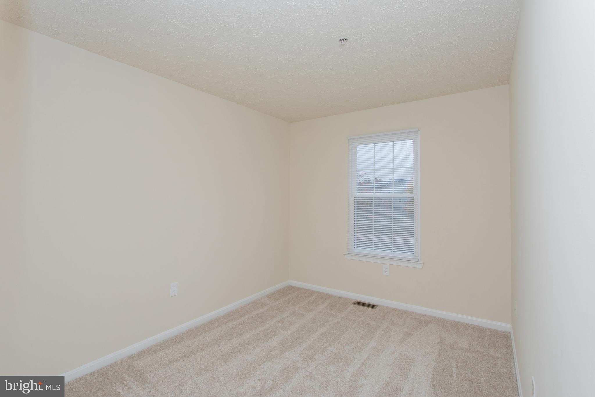 5704 Springfish Place Waldorf, MD 20603 - Photo 35 of 38 an empty room with a window
