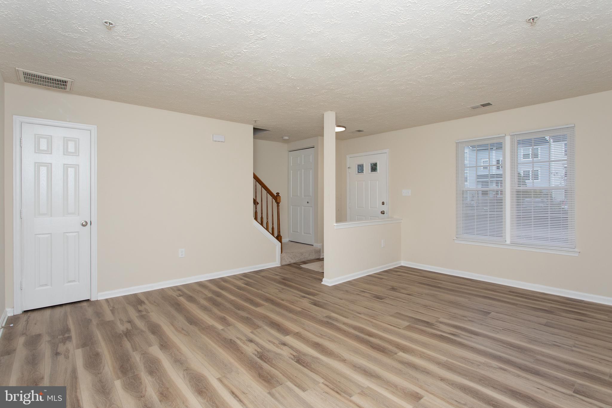 5704 Springfish Place Waldorf, MD 20603 - Photo 10 of 38 wooden floor in an empty room