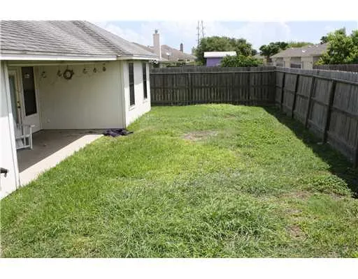 a view of balcony with wooden fence