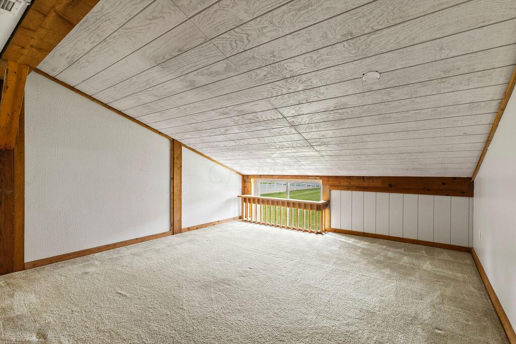 10389 Center Village Road, Unit A Galena, OH 43021 - Photo 28 of 39 bedroom 2 with window looking out to horse arena