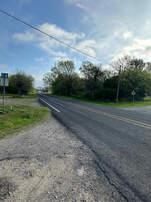 Tbd West Main Street Ladonia, TX 75449 - Photo 15 of 16 a view of a field with a big house