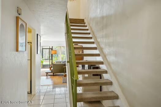 33 Cove Road Melbourne Beach, FL 32951 - Photo 11 of 34 a view of entryway and hall with wooden floor