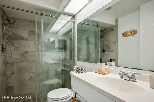 33 Cove Road Melbourne Beach, FL 32951 - Photo 21 of 34 a bathroom with a sink toilet and shower