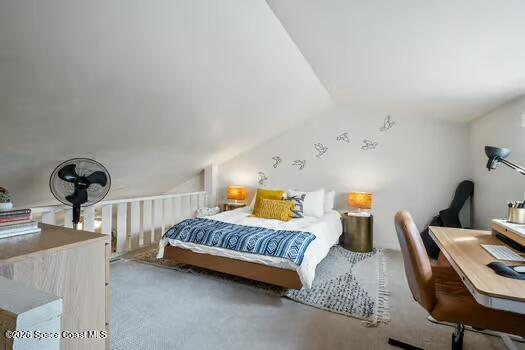 33 Cove Road Melbourne Beach, FL 32951 - Photo 28 of 34 a bedroom with a bed and a chair