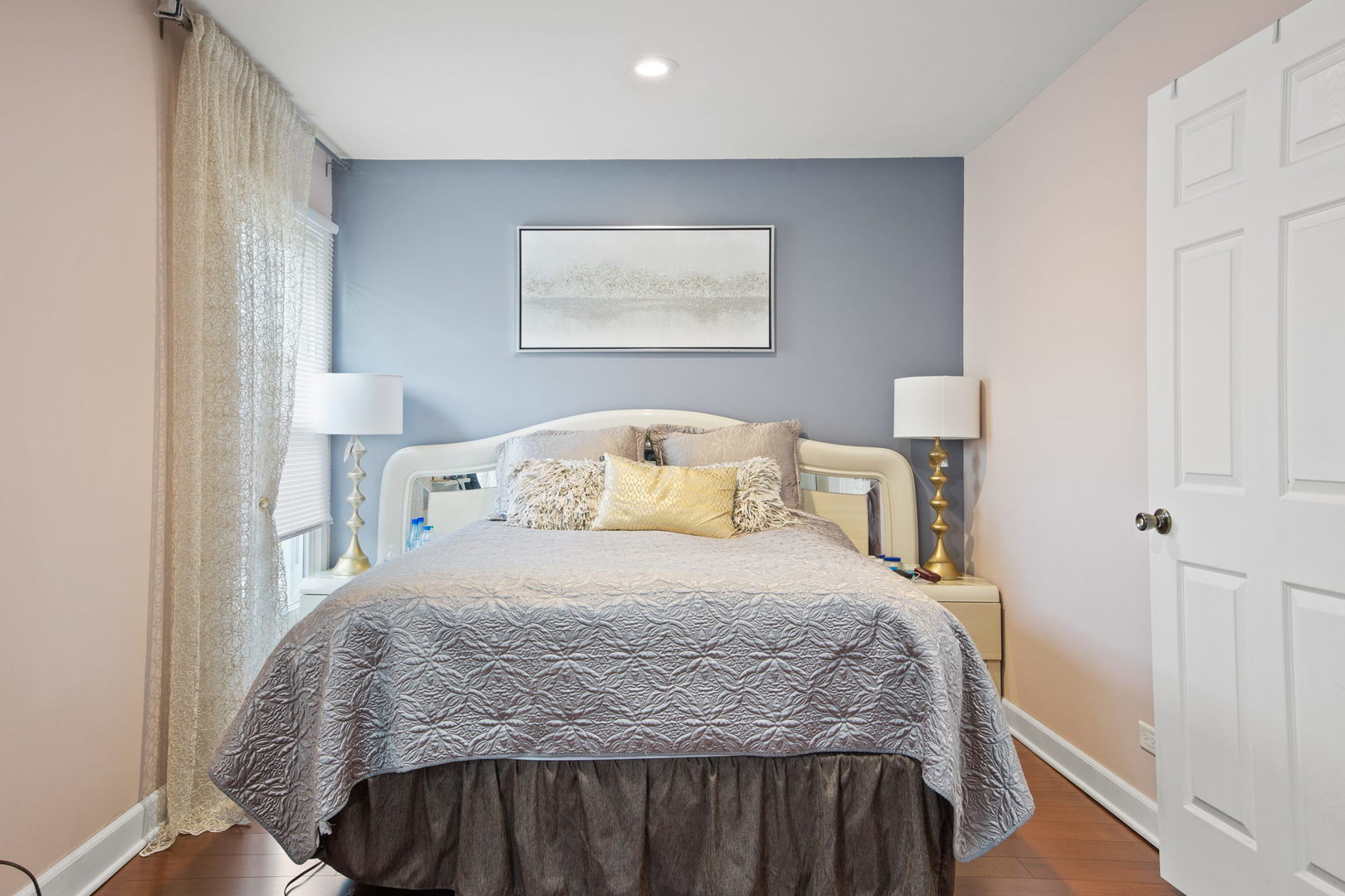 8 Greenvale Road Vernon Hills, IL 60061 - Photo 12 of 21 a bedroom with a bed and painting on the wall