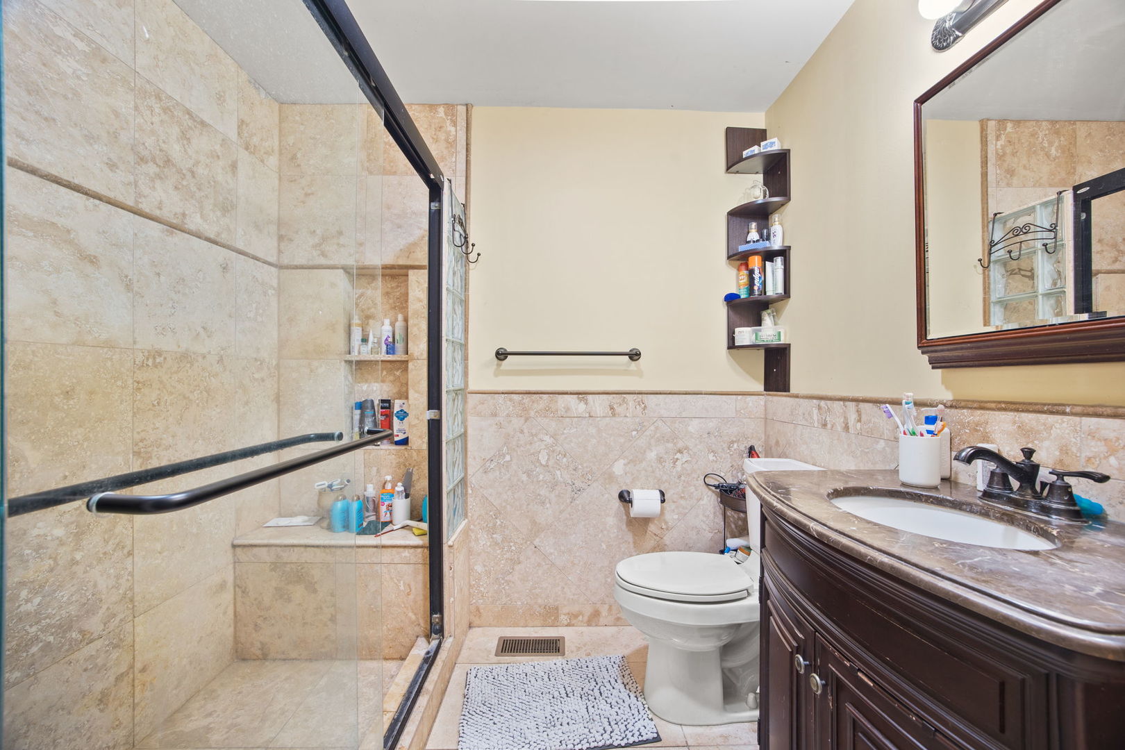 8 Greenvale Road Vernon Hills, IL 60061 - Photo 14 of 21 a bathroom with a sink a toilet and a mirror