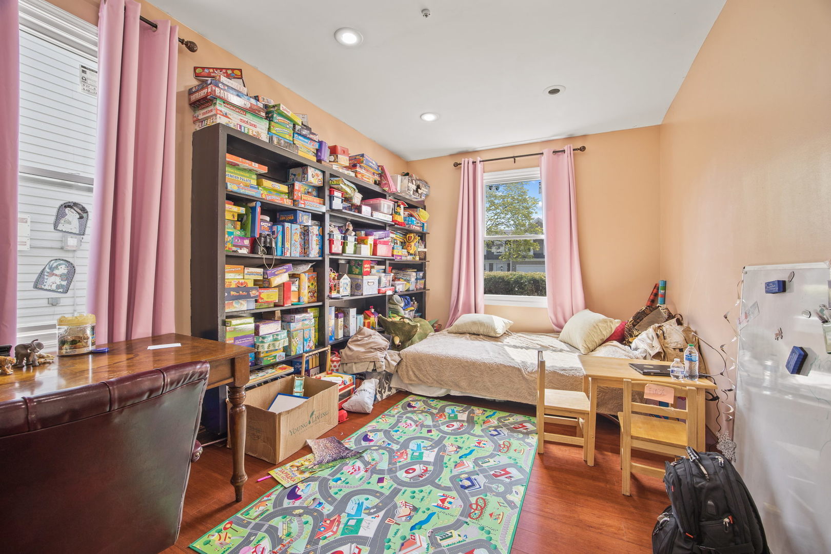 8 Greenvale Road Vernon Hills, IL 60061 - Photo 16 of 21 a bedroom with furniture and a book shelf