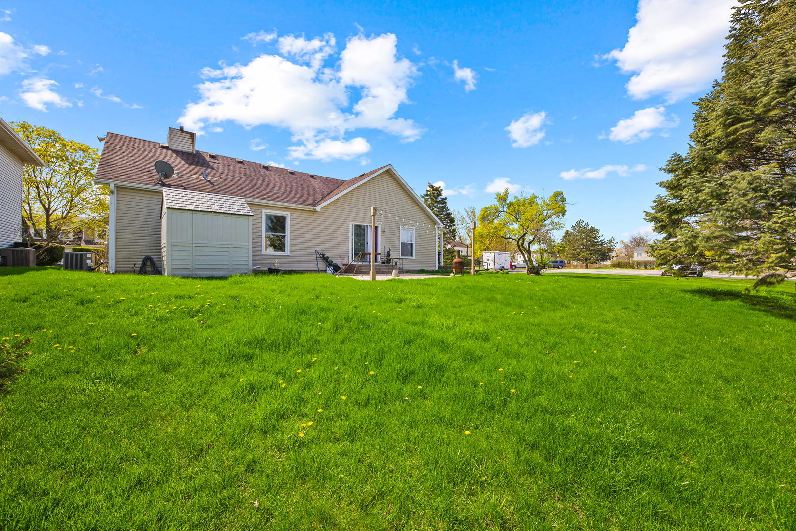 8 Greenvale Road Vernon Hills, IL 60061 - Photo 21 of 21 a big house with a big yard and large trees