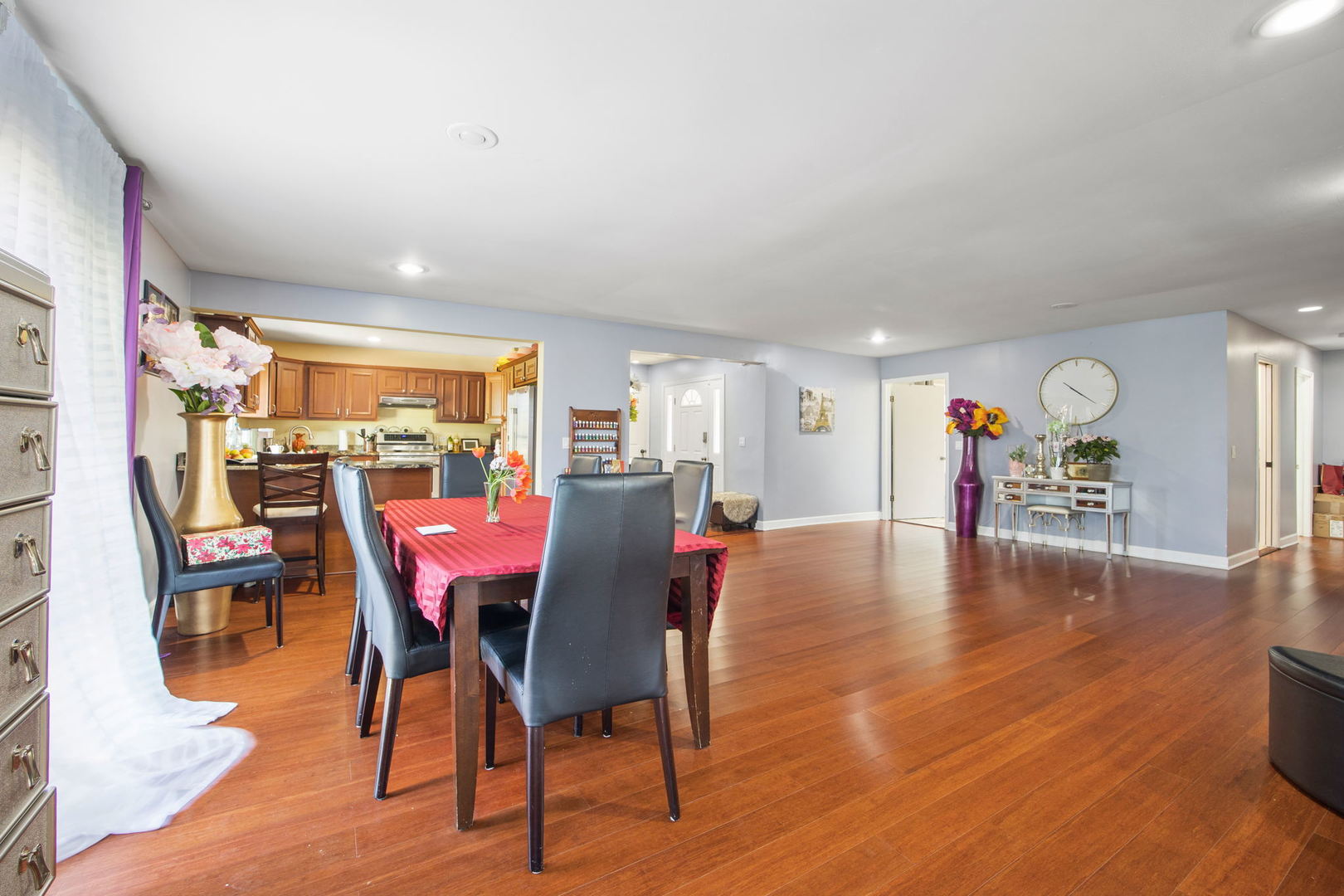 8 Greenvale Road Vernon Hills, IL 60061 - Photo 7 of 21 a view of a dining room with furniture and wooden floor