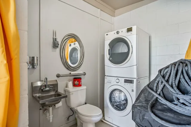 a view of a house with swimming pool and porch