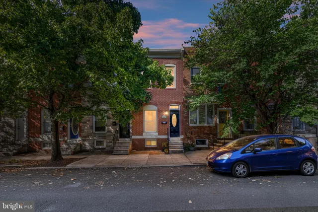 a car parked in front of a building