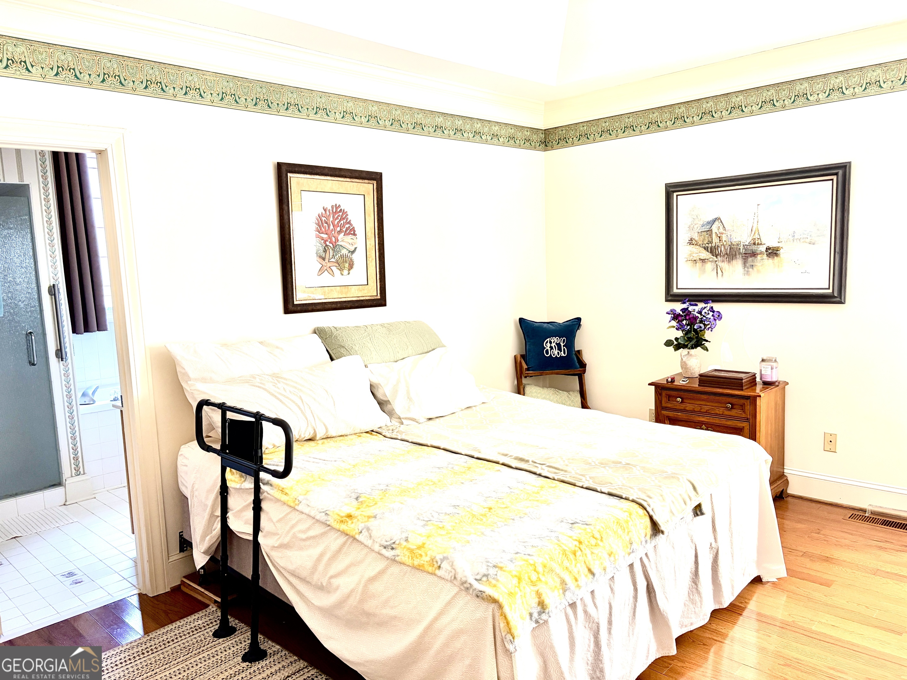 14 Saddlebrook Drive Rome, GA 30161 - Photo 14 of 29 a bedroom with a bed and a painting on the wall