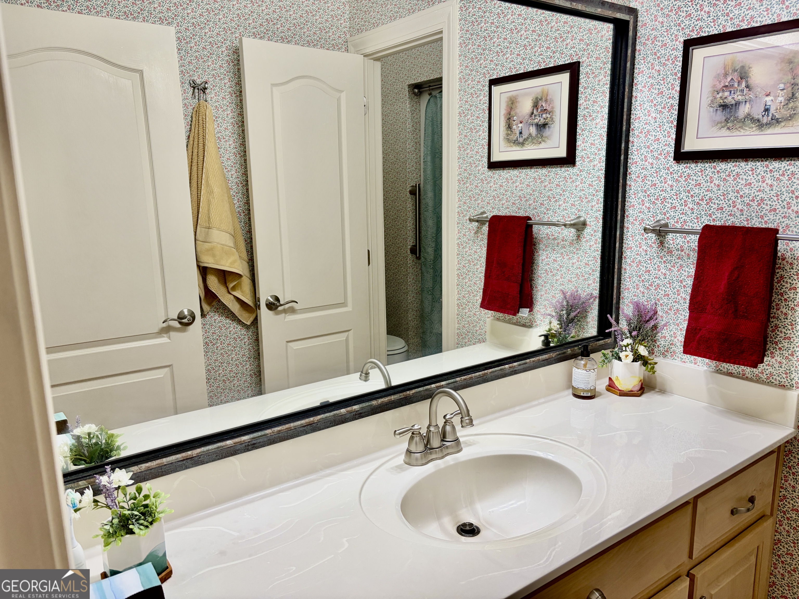 14 Saddlebrook Drive Rome, GA 30161 - Photo 20 of 29 a bathroom with a sink and a mirror