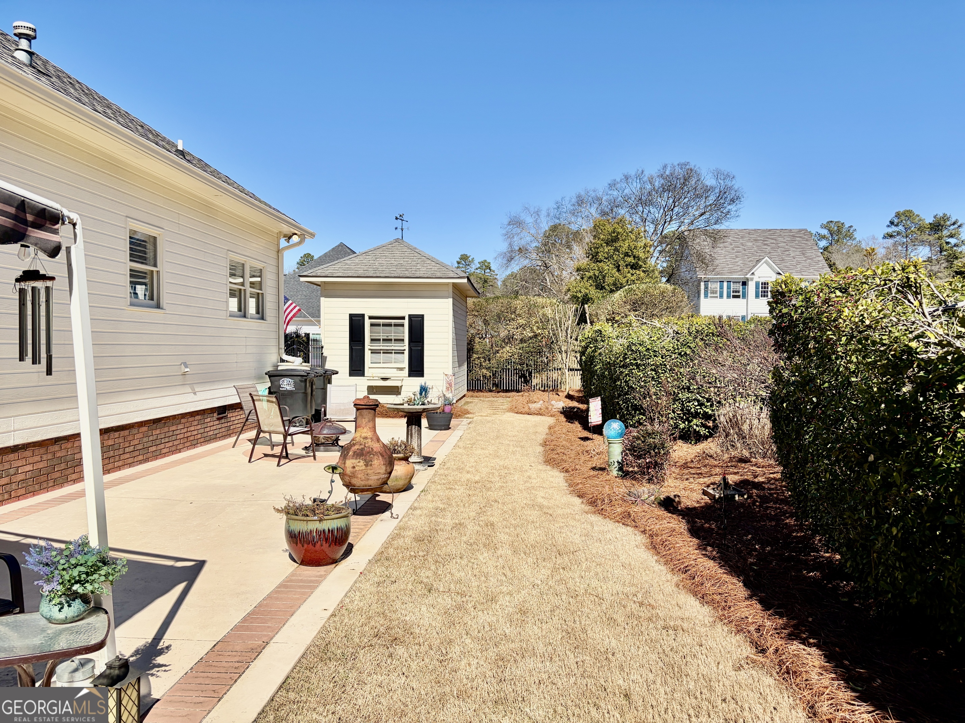 14 Saddlebrook Drive Rome, GA 30161 - Photo 4 of 29 a view of a backyard with plants and a patio