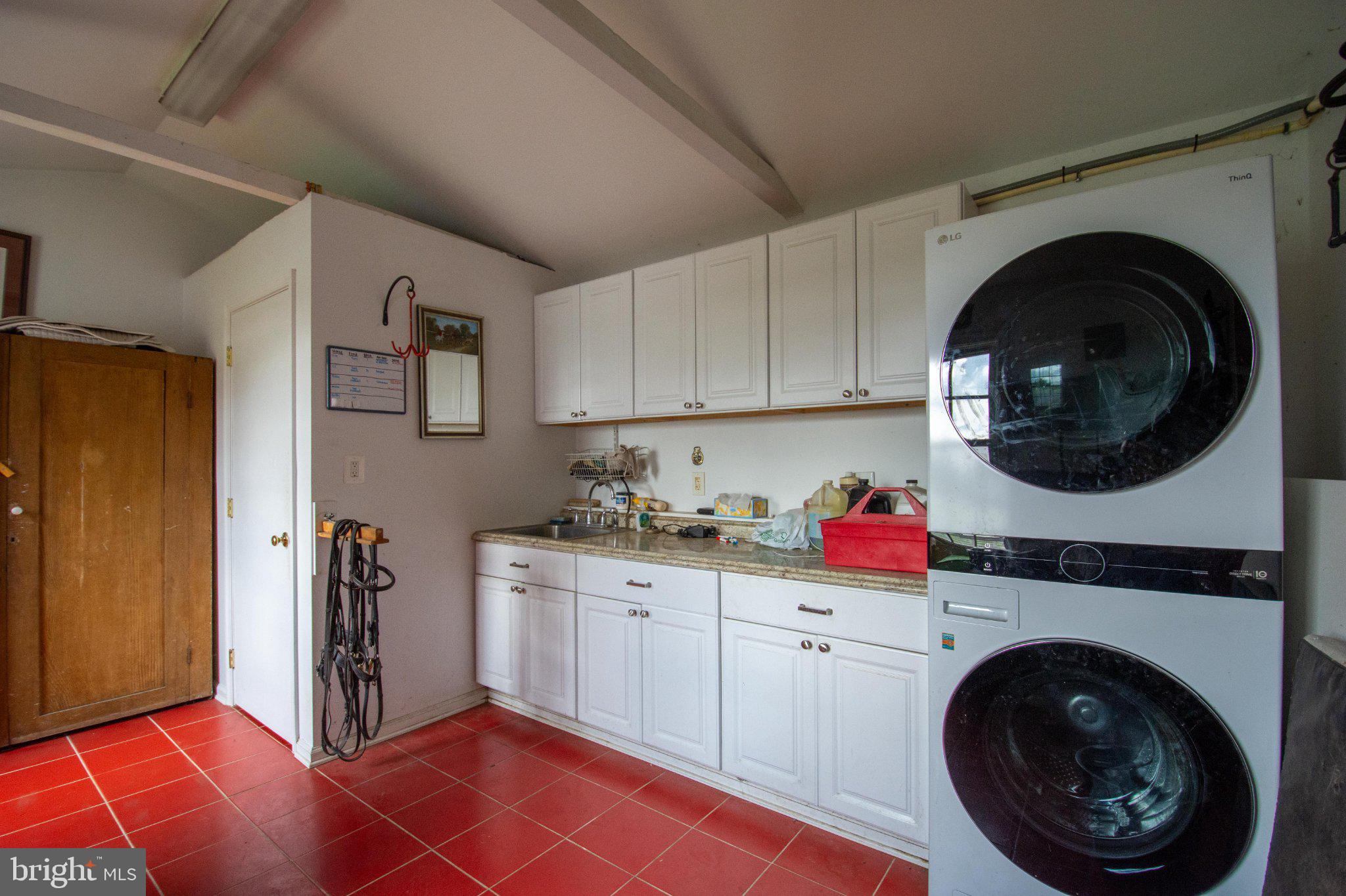 246 Mill Swamp Road Edgewater, MD 21037 - Photo 77 of 97 Full laundry and galley kitchen space