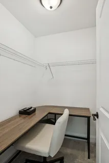 a view of a room with table and chair