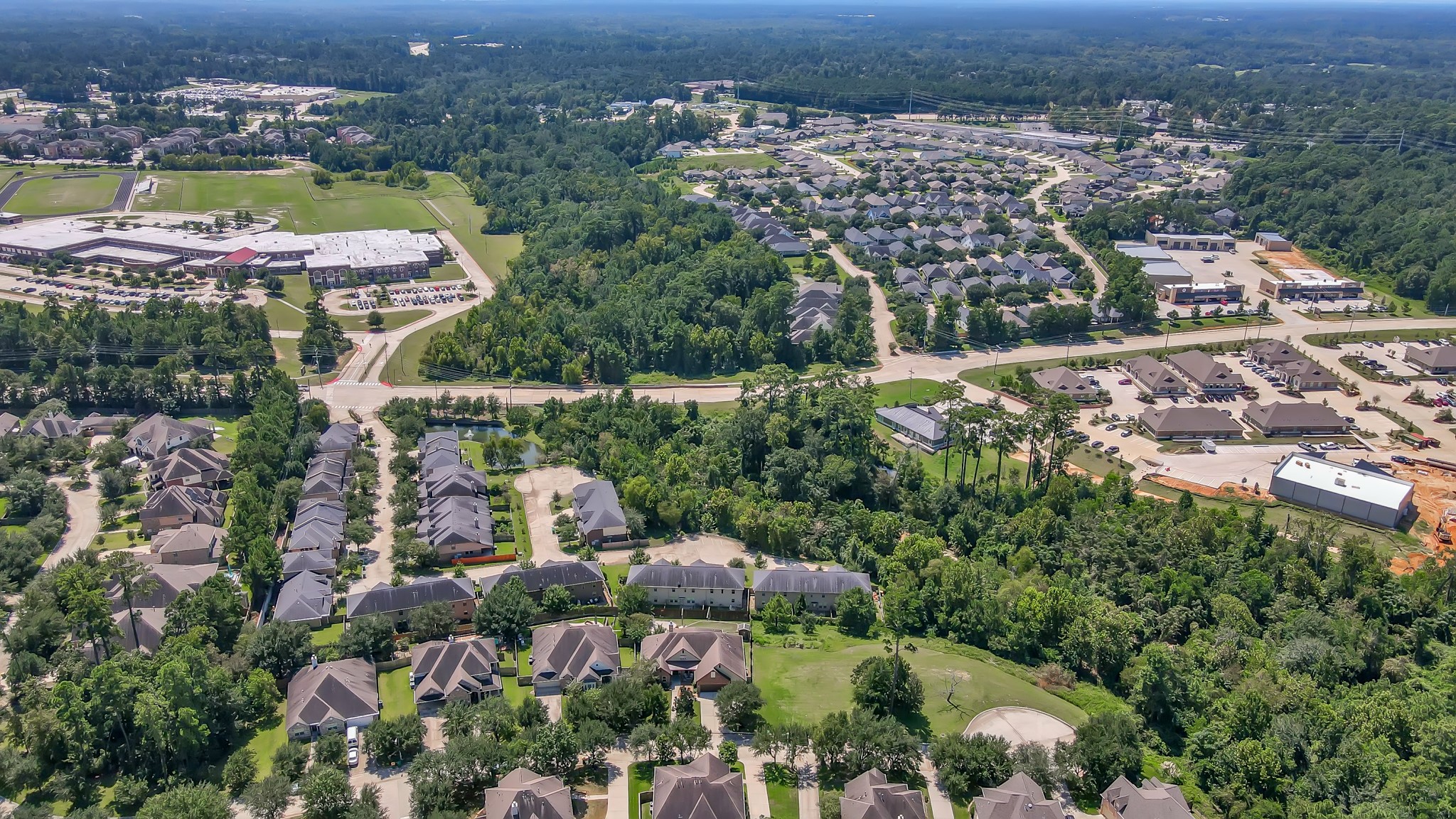 2400 Bramlet Drive Conroe, TX 77304 - Photo 13 of 14 an aerial view of multiple house