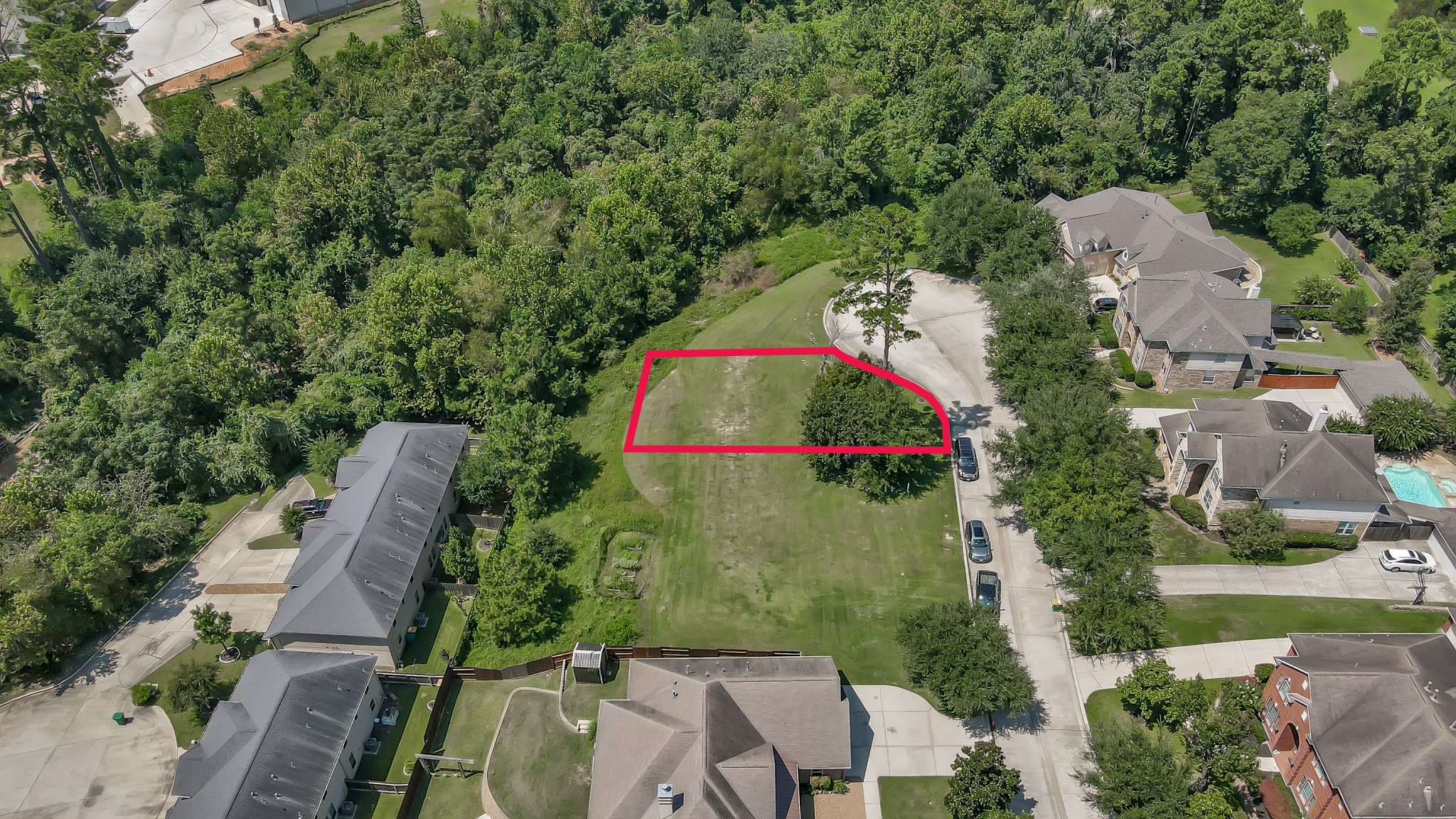 2400 Bramlet Drive Conroe, TX 77304 - Photo 9 of 14 an aerial view of a house