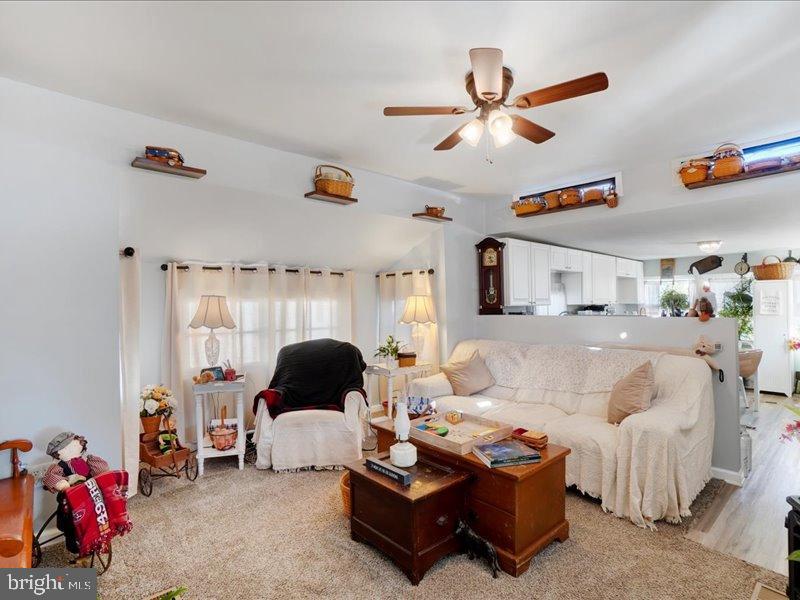 143 Pawnee Avenue Dover, PA 17315 - Photo 11 of 23 a living room with furniture and a chandelier