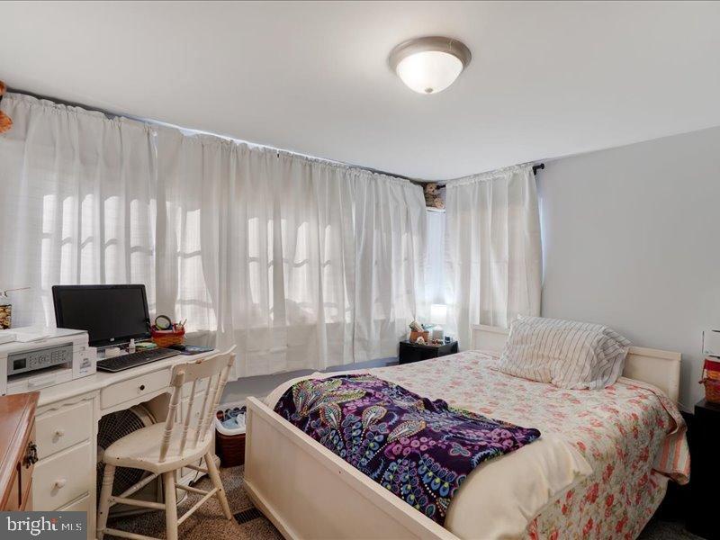 143 Pawnee Avenue Dover, PA 17315 - Photo 16 of 23 a bedroom with a bed and a window