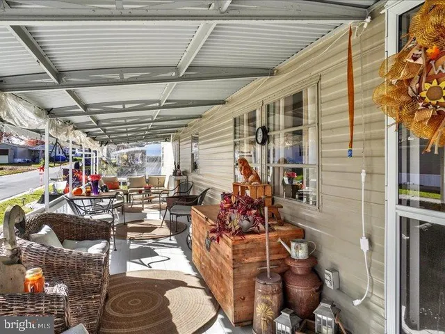 a view of a storage room with racks on the wall