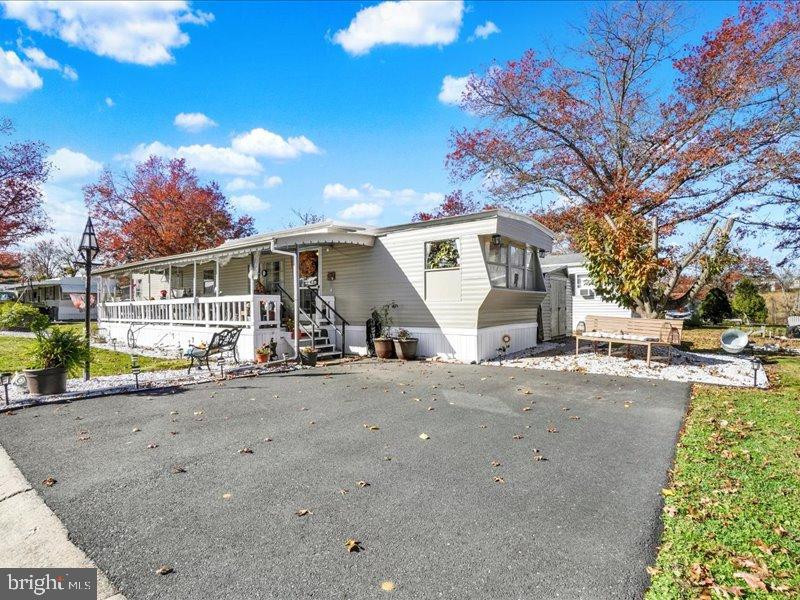 143 Pawnee Avenue Dover, PA 17315 - Photo 2 of 23 a view of a house with a yard and garage