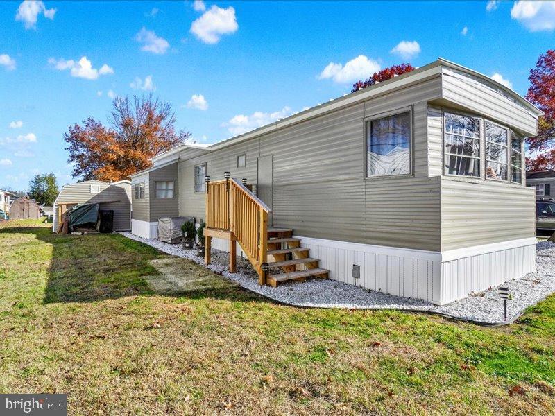 143 Pawnee Avenue Dover, PA 17315 - Photo 22 of 23 a view of a house with backyard and sitting area