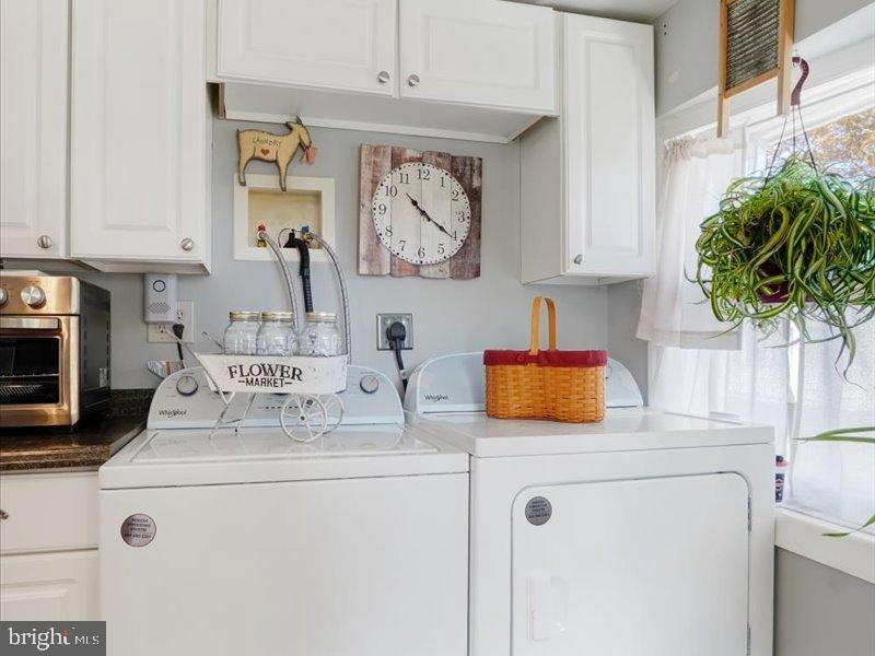 143 Pawnee Avenue Dover, PA 17315 - Photo 6 of 23 a kitchen with stainless steel appliances granite countertop a sink a stove and a window