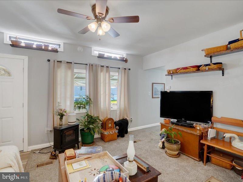 143 Pawnee Avenue Dover, PA 17315 - Photo 10 of 23 a living room with furniture and a flat screen tv