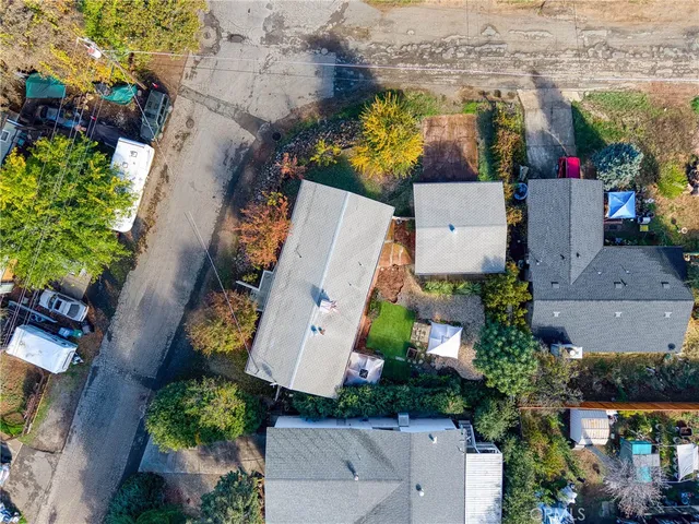 an aerial view of a house with a garden