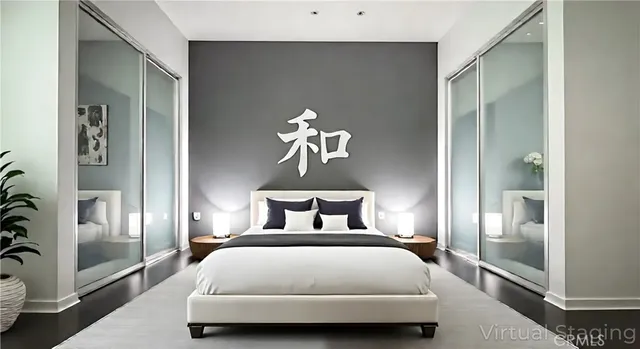 a bedroom with a bed and glass door