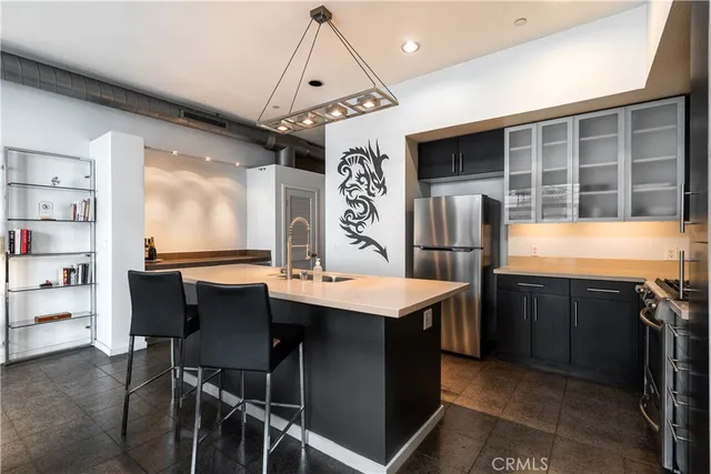 a kitchen with a stove and a sink