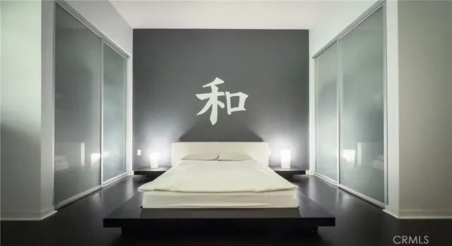 a view of a bedroom with a chandelier