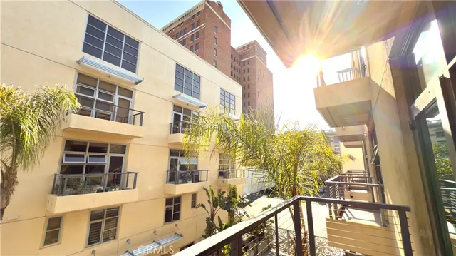 a view of a house with large tree