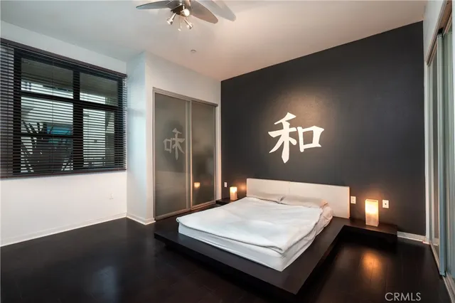 a hallway with furniture and chandelier