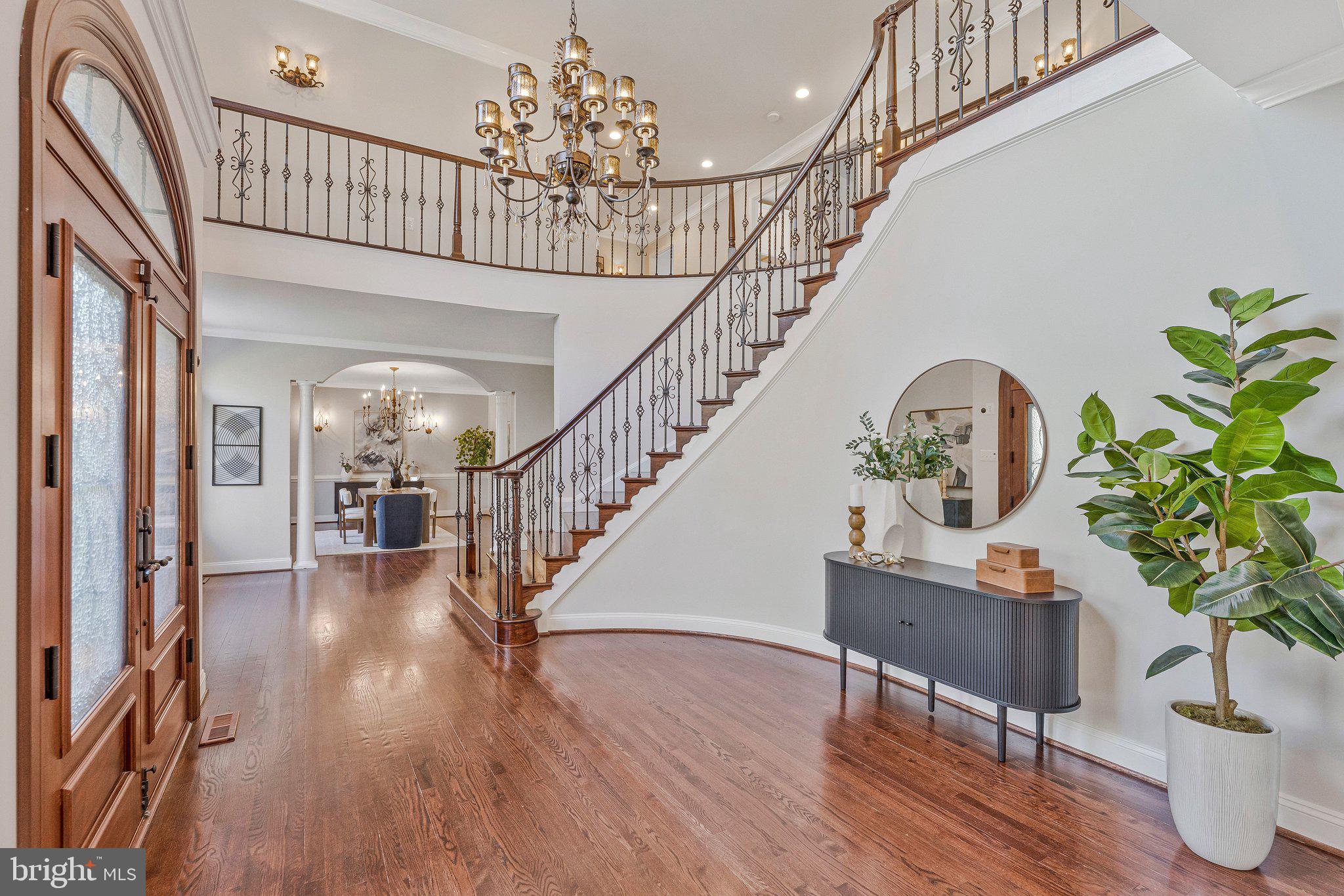 8611 Brook Road McLean, VA 22102 - Photo 11 of 104 a view of entryway and hall with wooden floor
