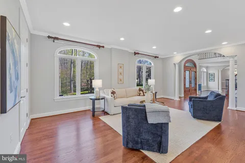 a stove top oven sitting inside of a kitchen