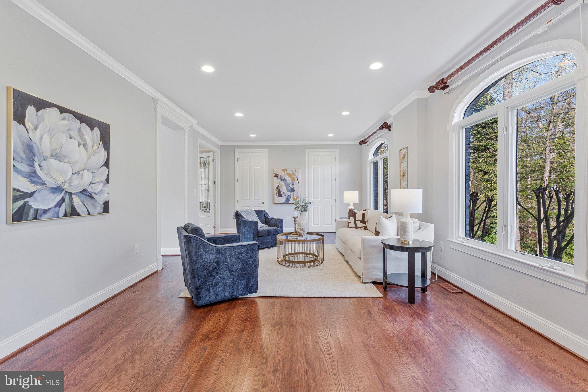 8611 Brook Road McLean, VA 22102 - Photo 15 of 104 a living room with furniture and wooden floor