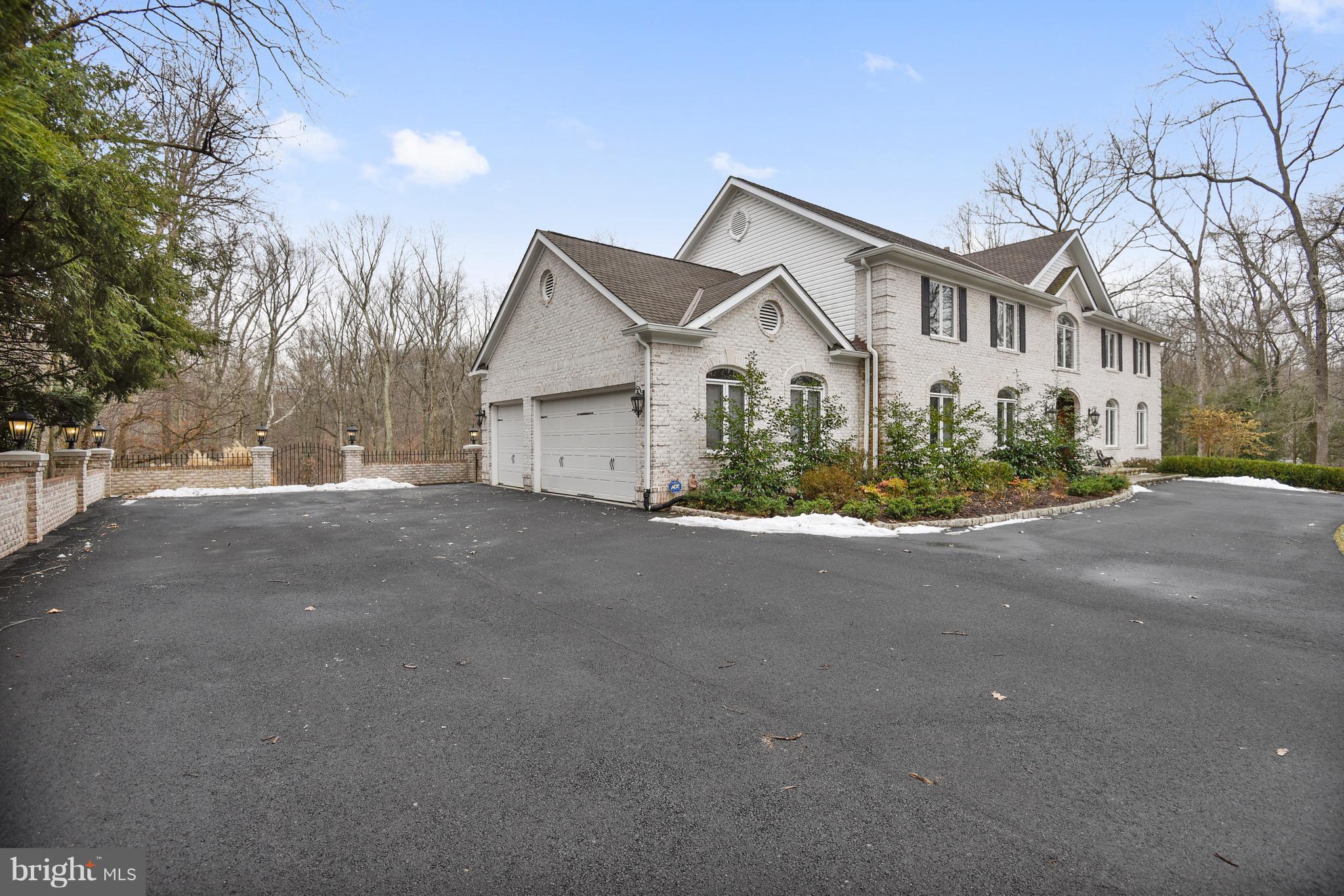 8611 Brook Road McLean, VA 22102 - Photo 3 of 104 a view of a house with a street
