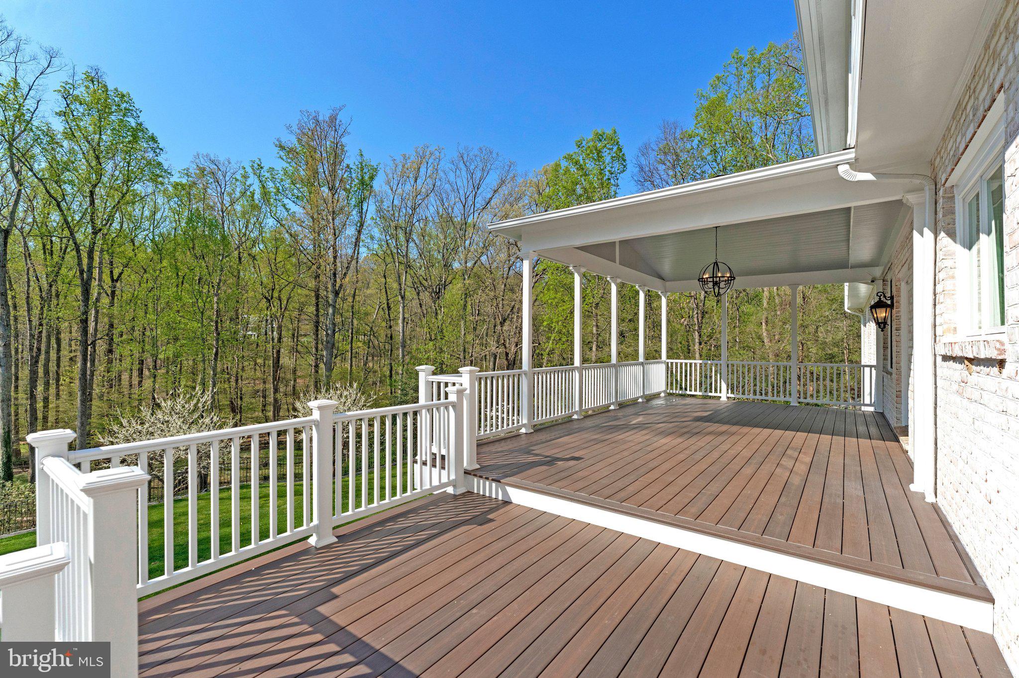 8611 Brook Road McLean, VA 22102 - Photo 38 of 104 a view of backyard with a deck