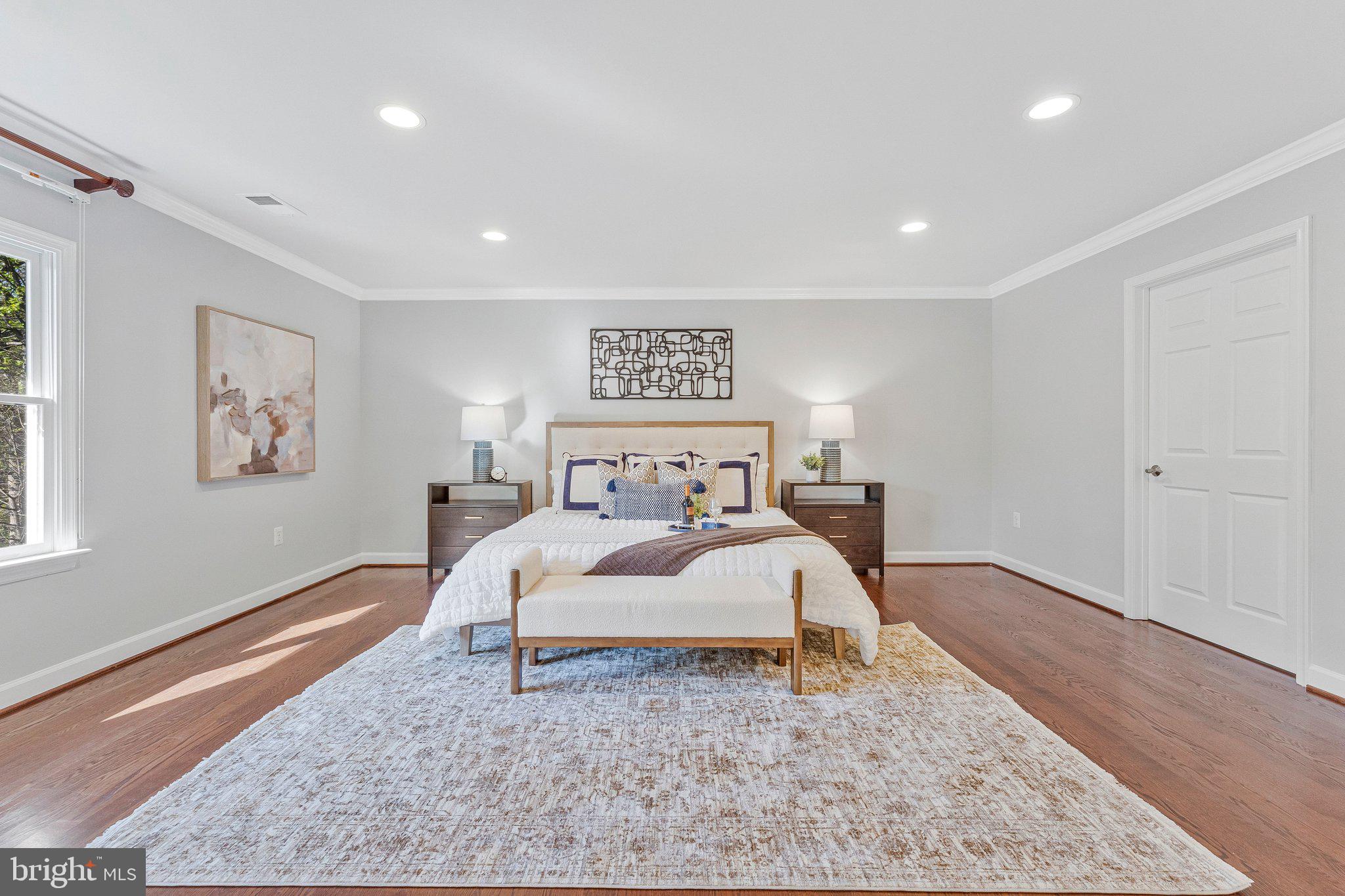 8611 Brook Road McLean, VA 22102 - Photo 47 of 104 a bed room with a bed and a night stand