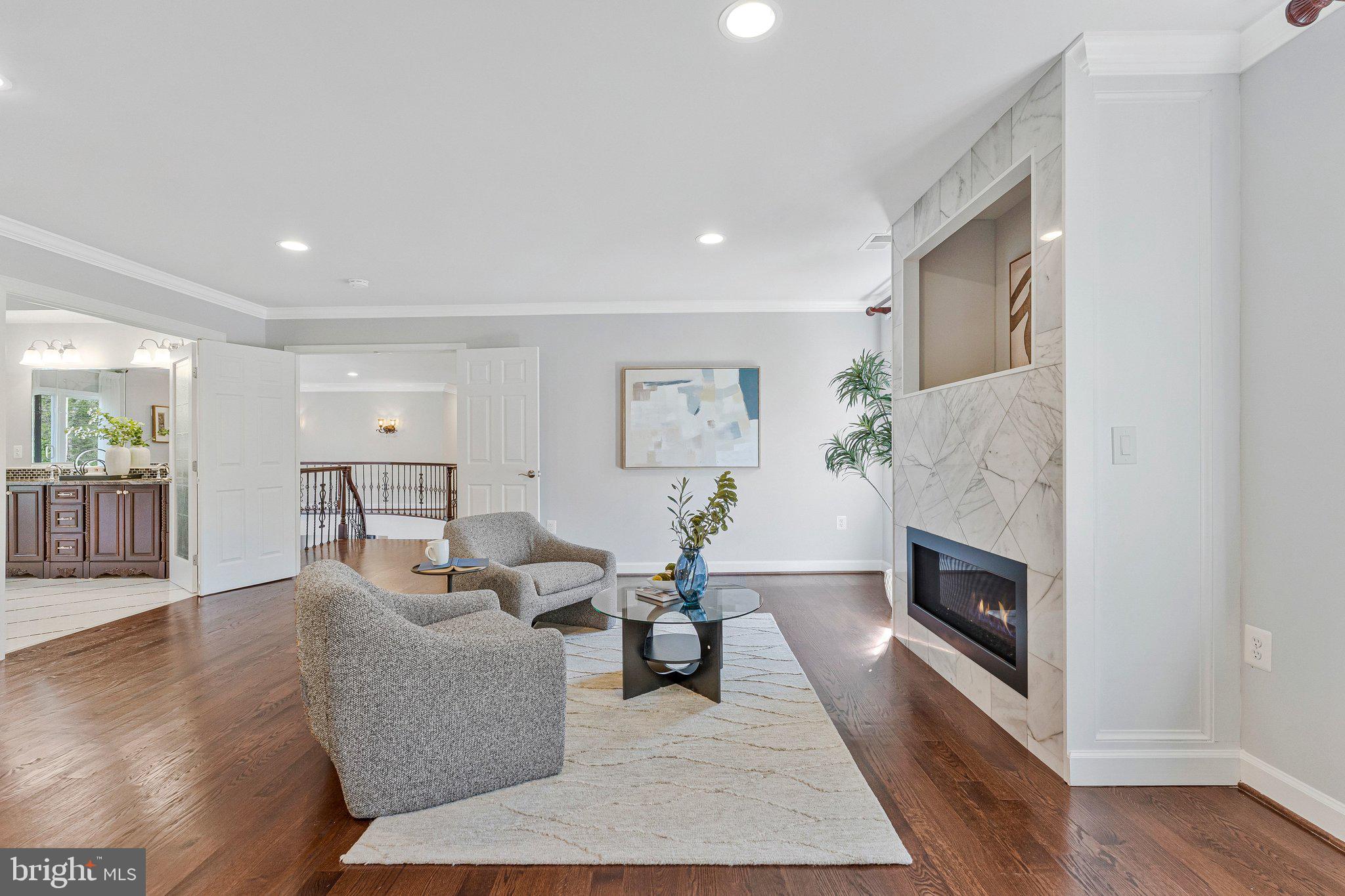 8611 Brook Road McLean, VA 22102 - Photo 49 of 104 a living room with furniture and a fireplace