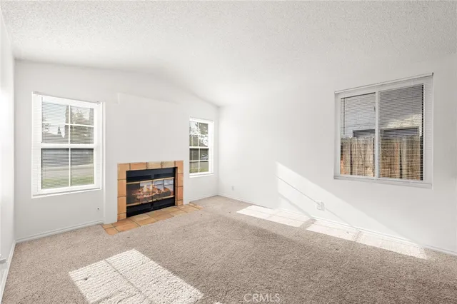 a view of livingroom with a fireplace