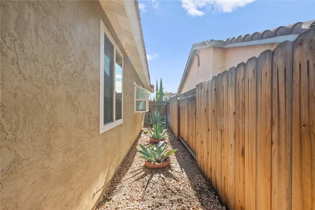 a view of a tables and chairs in patio