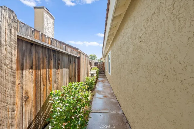 an aerial view of a house with a ocean view