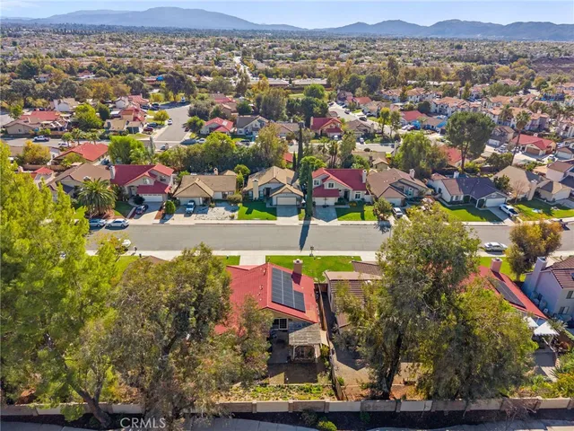 an aerial view of city and lake