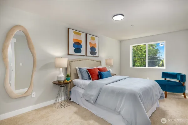 a bedroom with bed and window