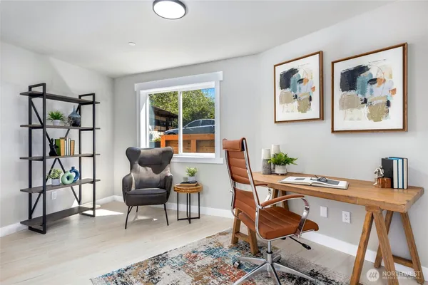 a kitchen that has a lot of cabinets a sink and a stove