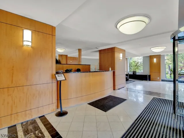 a view of a hallway with a door