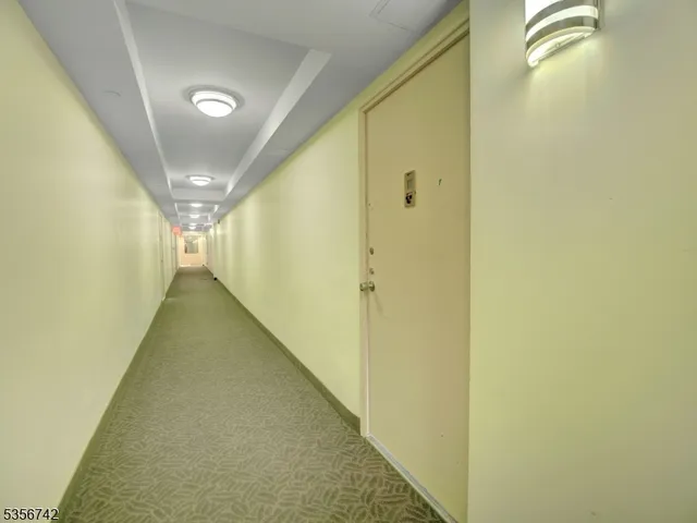 a view of a livingroom with furniture and a couch